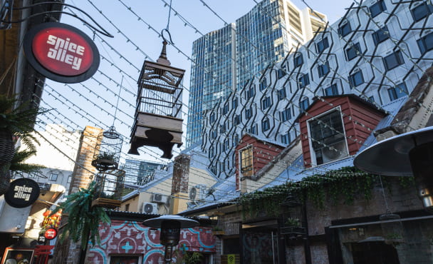 Spice alley in Sydney with Iglu Broadway building in the background
