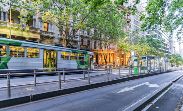 The tram in Melbourne city in the twilight on a main street