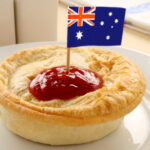 meat pie classic aussie dish with tomato sauce and australian flag