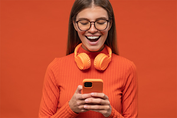 university student dressed in orange
