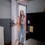 First year female student arriving in student accommodation room